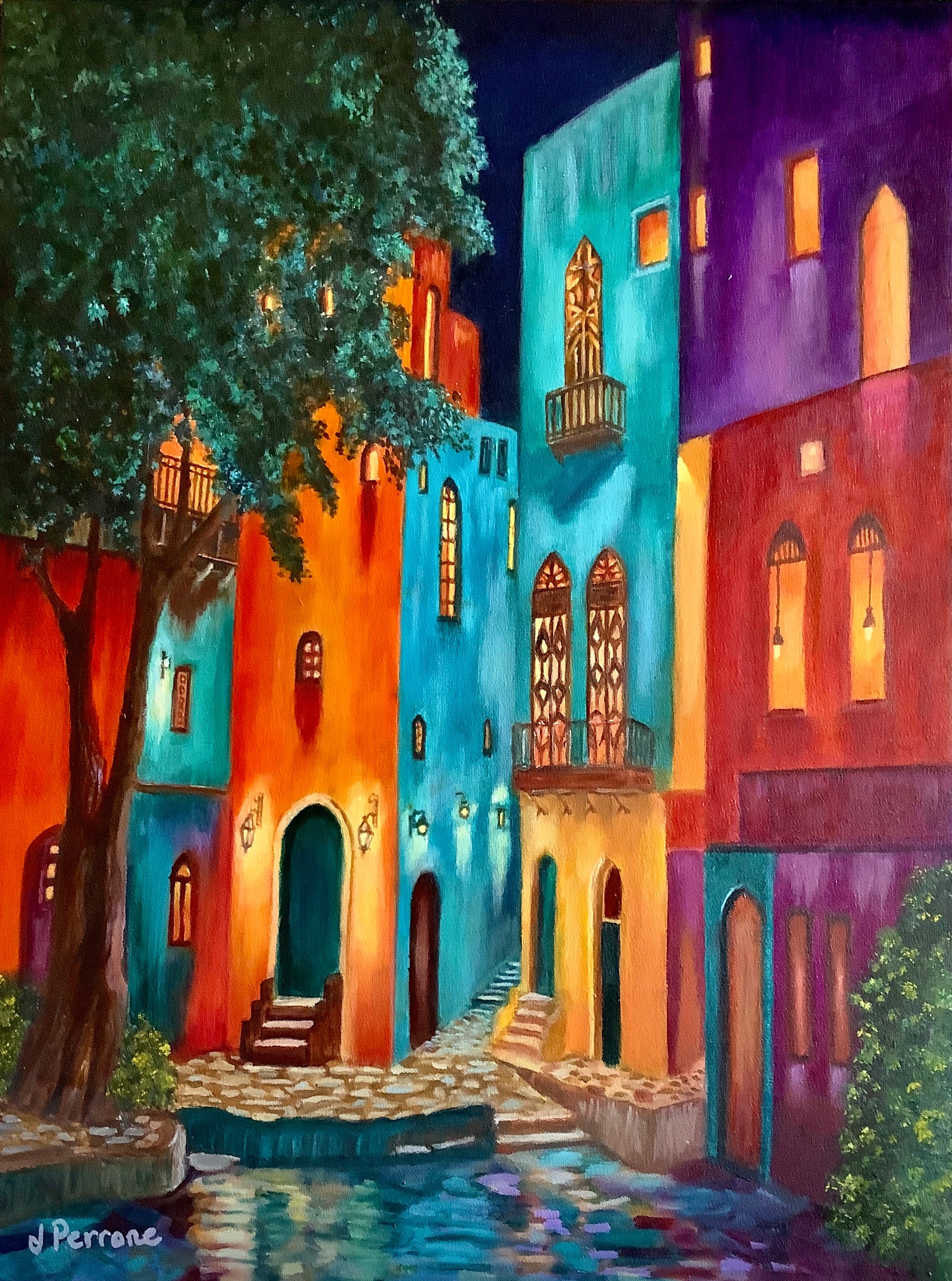 Colorful street scene with buildings and trees at night